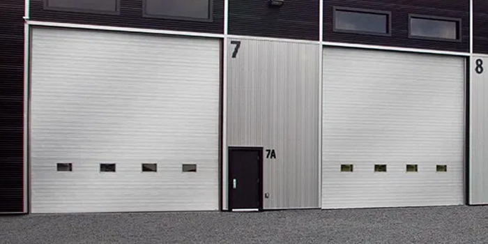 fix bent garage door in Wellington